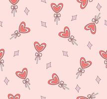 Seamless pattern with heart shaped lollipop on pink background. vector