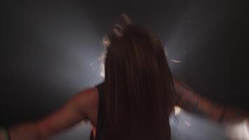 Man playing drums in heavy metal rock band, slow motion video