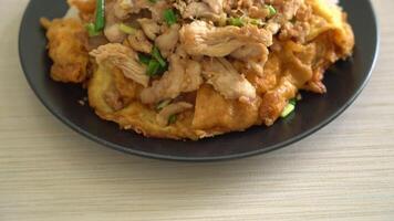 Stir-Fried Pork with Garlic and Egg Topped on Rice with Sauce video
