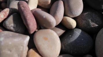 A pile of rocks with different colors and sizes video