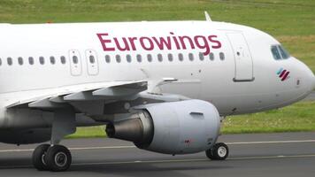 DUSSELDORF, GERMANY JULY 23, 2017 - Airbus A319112, DABGK of Eurowings taxiing at Dusseldorf airport, side view video