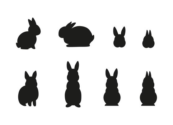 Set of simple black different rabbit silhouettes isolated on white background