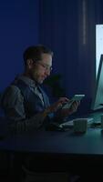 A dedicated professional is working late at night, fully engaged with digital tasks and projects video