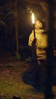 Immerse Yourself in an Enigmatic Journey Navigating the Woods with a Torchlight Adventure video