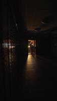A Mysterious Corridor With Dim Lighting, Flickering Shadows and Eerie Ambiance Surrounding It video