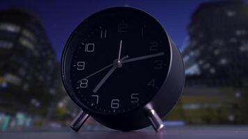 A Stylish Black Alarm Clock featured in a Beautiful Urban Setting during Dusk Hours video