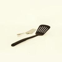 Essential Kitchen Utensils Spatula and Turner designed for effective Cooking and Food Preparation photo