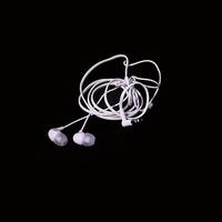 Stylish and Elegant White Earbuds Featuring a Tanglefree and Userfriendly Design photo