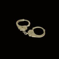 Handcuffs serve as a powerful symbol of law enforcement and the justice system as a whole photo