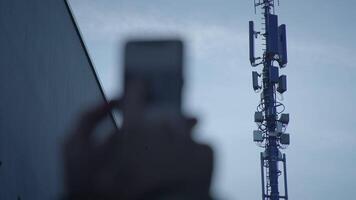 5G Communication Antenna Tower Sending Mobile Phone Data Signal Wireless Transmitting video