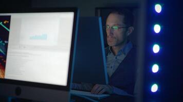 A Dedicated Professional Engaged in Analyzing Data on Their Computer Screen in a Focused Manner video