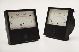 Voltmeter and ammeter on a white background. photo