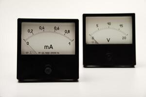 A means of measuring electric current and voltage.Voltmeter and ammeter on a white background. photo
