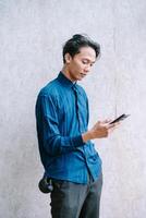Man Using Mobile App photo