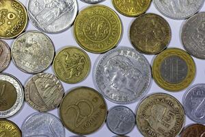 Various collectible coins from different countries photo