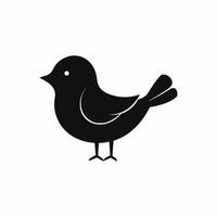 Black bird with a beak is standing on a white background. The bird is looking to the right vector