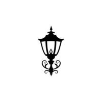 Lamp with a light on it is shown in black and white. The lamp is a simple design, with a base vector