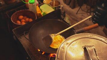 Frying an Egg in a Rustic Kitchen video