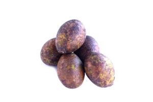 Hog plum fruits isolated on white background. Concept, edible wild fruit with sour taste, can eat as fresh fruit or mix with food for sour flavor . photo