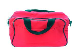 Red bag isolated on white background. Concept, equipment for containing things or cloth when traveling. Baggage or luggage using in daily life. photo