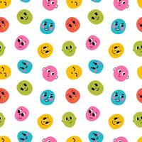 Seamless pattern of colorful smiling faces vector