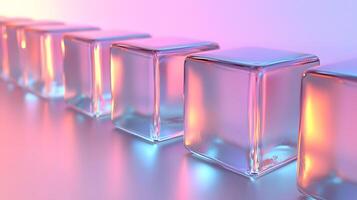 Transparent glass cubes arranged in a row displaying iridescent reflections and holographic effects, illuminated by pink and blue gradient lighting on a white background. arrangement photo