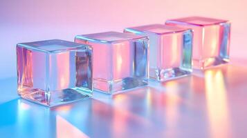 Transparent glass cubes arranged in a row displaying iridescent reflections and holographic effects, illuminated by pink and blue gradient lighting on a white background. material photo