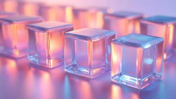 Transparent glass cubes arranged in a row displaying iridescent reflections and holographic effects, illuminated by pink and blue gradient lighting on a white background. cubes photo