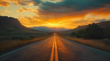 Scenic mountain road curves through rolling hills at sunset, golden sky and dramatic clouds create cinematic landscape with perfect perspective. discovering photo