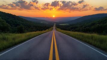 Scenic mountain road curves through rolling hills at sunset, golden sky and dramatic clouds create cinematic landscape with perfect perspective. mountain photo