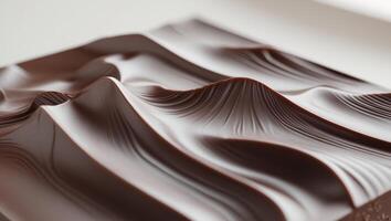 Rich Chocolate Bar Texture With Smooth Waves Captured in a Close Up View photo