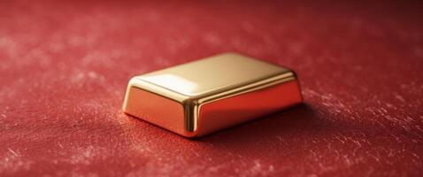 Golden Ingot on Vibrant Red Textured Background for Wealth and Prosperity. photo