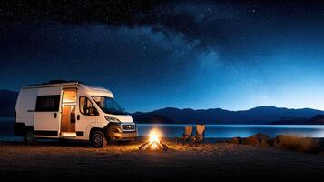 camper van by campfire under starry night sky, creating cozy atmosphere photo
