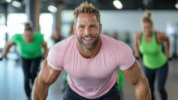 High energy fitness class with smiling man and focused participants photo