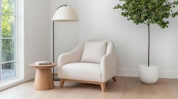 cozy corner with oversized armchair, side table, and plant photo