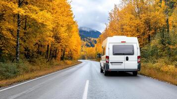 road trip scene with camper van driving through vibrant autumn trees photo