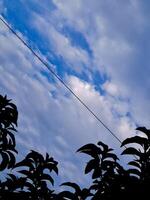 A blue sky with clouds photo