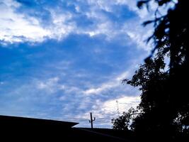 A blue sky with clouds photo