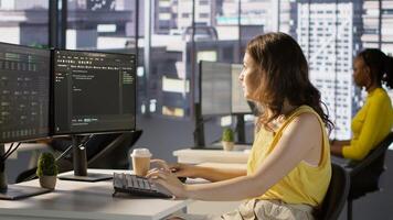 Cheerful manager in wheelchair doing high five with employee testing machine learning software. Team leader with disability saluting worker, doing friendly gesture, camera A photo