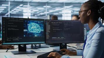 Woman programming in AI data center housing advanced equipment used for machine learning training. African american admin running code to upgrade artificial intelligence tech, camera B close up photo