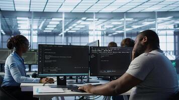 System admin feeling ill, having fever while working in computer network security data center. Sick worker suffering headache while monitoring energy consumption across server racks, camera B photo
