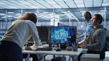 Admin panicking after computer crash affecting server room AI workloads, spamming keyboard keys. Artificial intelligence employee struggling to repair data center systems after network failure, camera B photo