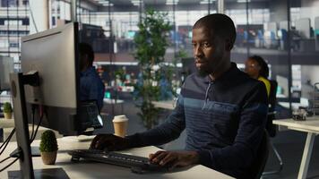 Portrait of happy programmer working with machine learning artificial intelligence critical to autonomous systems. Upbeat software engineer transforming data into predictive models, camera B photo