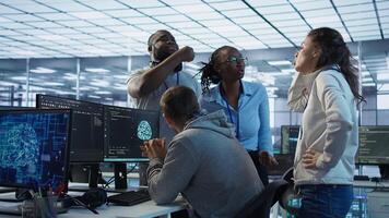 Employees fighting in office after mistake leading to errors in high tech AI data center. IT workers arguing server farm workplace after damaging artificial intelligence supercomputers, camera B photo