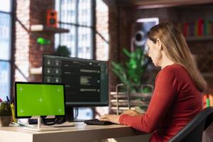 Freelancer uses AI assistant to generate solutions for tasks next to mockup, remote work at home office. Exemplifying smart automation and seamless connectivity for productivity online. photo