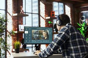 Man listening music uses AI GPT application turning text prompt into photos. Person wearing headphones, hearing podcasts, using text to image generative models with neural network tech photo