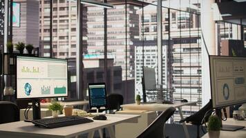Empty high end workspace with advanced tech tools enhancing productivity, helping business professionals focus on financial strategies. Global enterprise ensuring firm objectives. photo