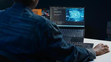 AI professional in home office using laptop to write programming language code. Artificial intelligence engineer working from home using notebook device to build application, camera A photo