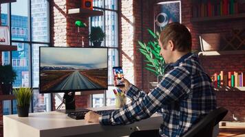 Man at home watching social media live broadcasts, interacting in chat with online content creators. Person holding phone, using social network app to partake in livestreams, camera A photo
