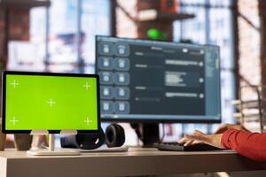 Woman interacting with intelligent AI chatbot on pc next to mockup display, using smart innovative system. Machine learning enhances efficiency and communication through advanced algorithms. photo